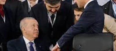 Strange act of Turkish President, why did he hold Macron's finger?