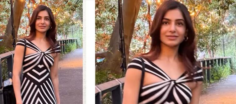 Samantha serves effortless elegance in a black-and-white striped Zimmermann dress
