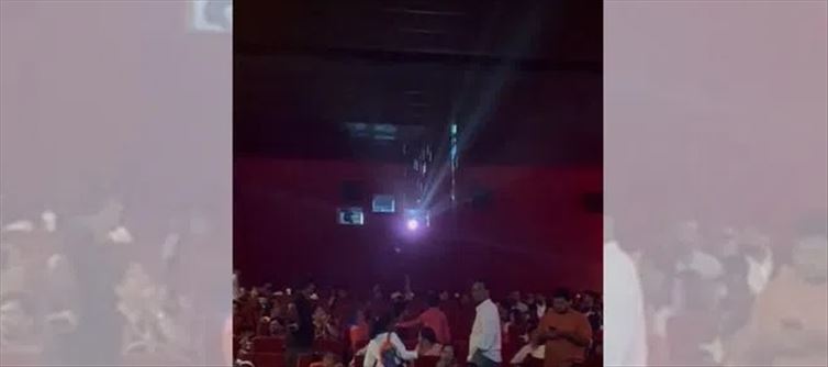 Telangana Hyderabad - Water leaks from roof of theatre in Punjagutta as heavy rains lash