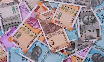 Rupee touched a high of 74 against US Dollar