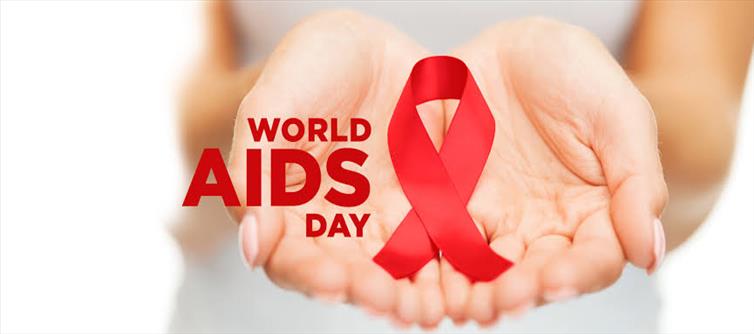 ఎయిడ్స్ డే: రెడ్ రిబ్బన్ గుర్తుగా ఎందుకు చూపిస్తారు?