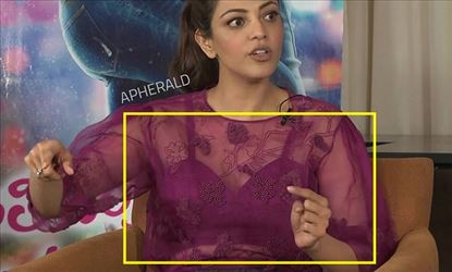 Kajal Aggarwal wears a Transparent Top and exposes her Brassiere during a TV Interview - Hot Photos Inside