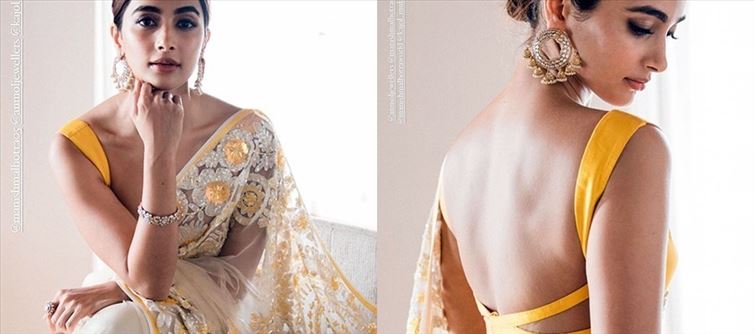 HOT PICS - Pooja Hegde decked up in a Ravishing Sleeveless Yellow Saree