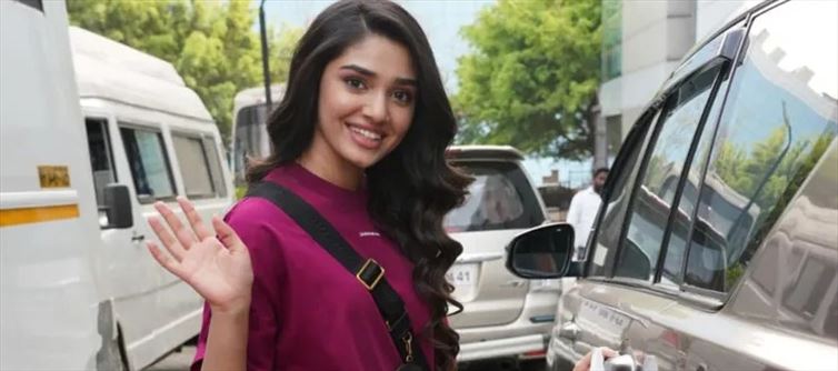 Krithi Shetty Slays in maroon tee & ripped jeans - Photos