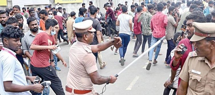 Police Laththi Charge on CSK fans while buying Tickets - Girls also beaten