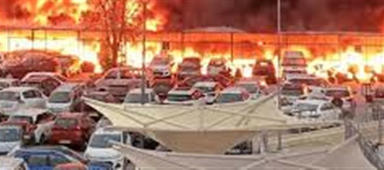 Vehicles parked in the parking lot caught fire