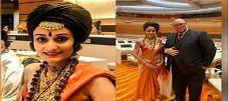 Who is Vijayapriya Nithyananda arrived at the United Nations dressed in saffron?