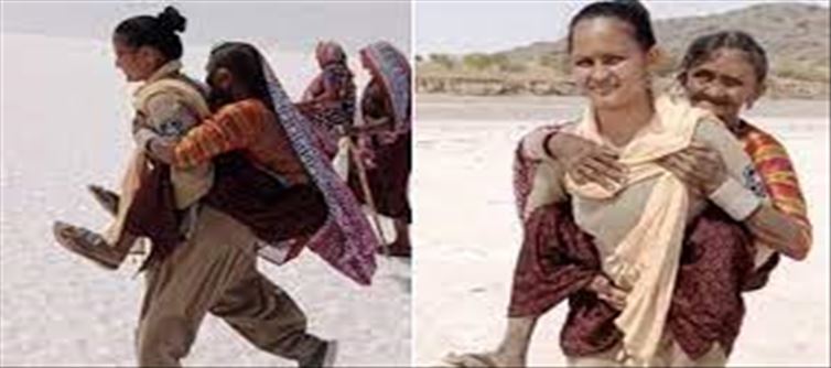 Woman police carries an old woman on her shoulders!!
